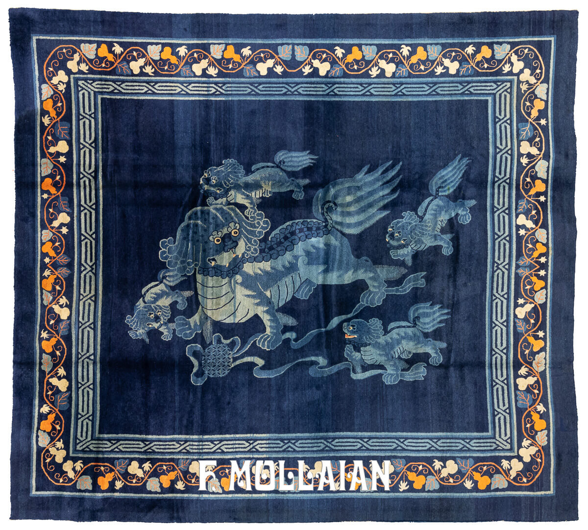 Antique Peking carpet featuring a deep blue field with Foo Dog motifs and floral borders in gold, orange, and ivory, handwoven in traditional Chinese craftsmanship.