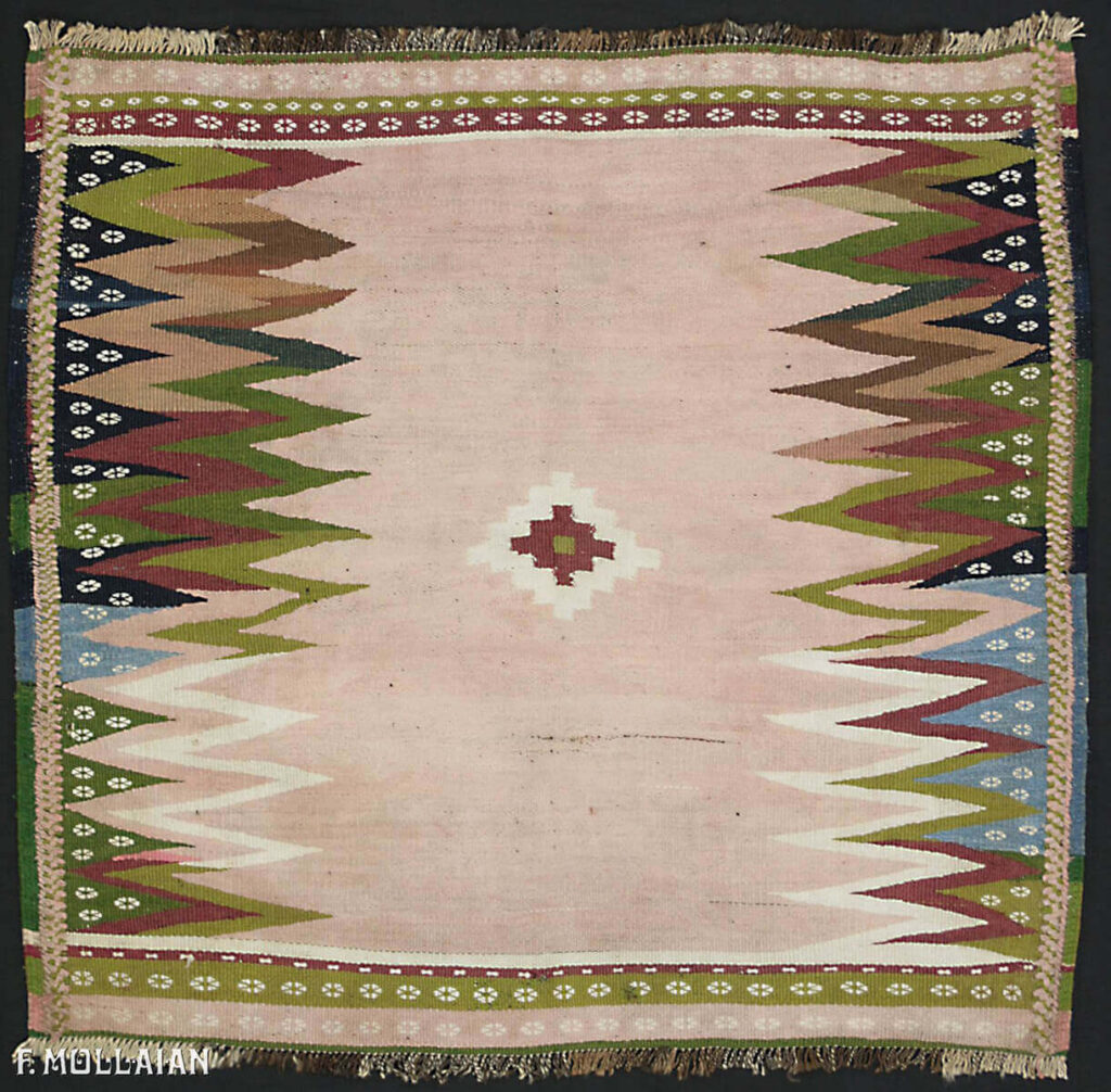 Persian Sofreh Kilim, handwoven in wool with a geometric tribal design in pink, green, and earthy tones. Circa 1950, 100 × 110 cm.